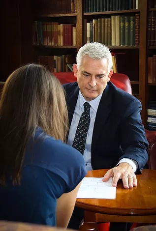 Michael Robbins meeting with a client